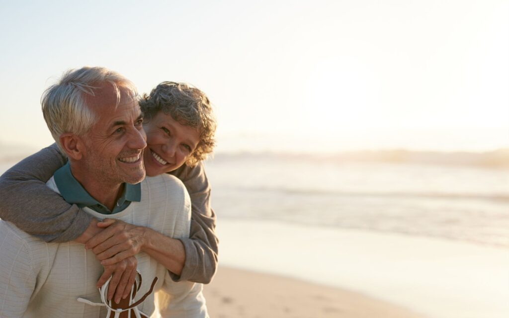 Mature couple beach holiday. March Super Saver Short Breaks at Searles Leisure Resort.